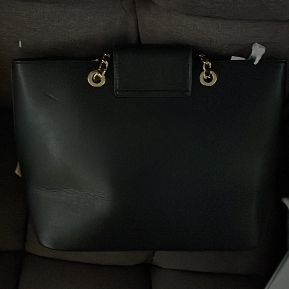 Black Ellen Tracey handbag with gold hardware. - Picture 2 of 2